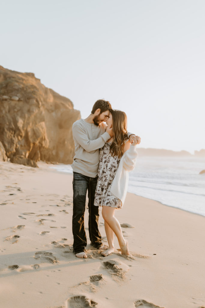 couple at the California beach in Big Sur