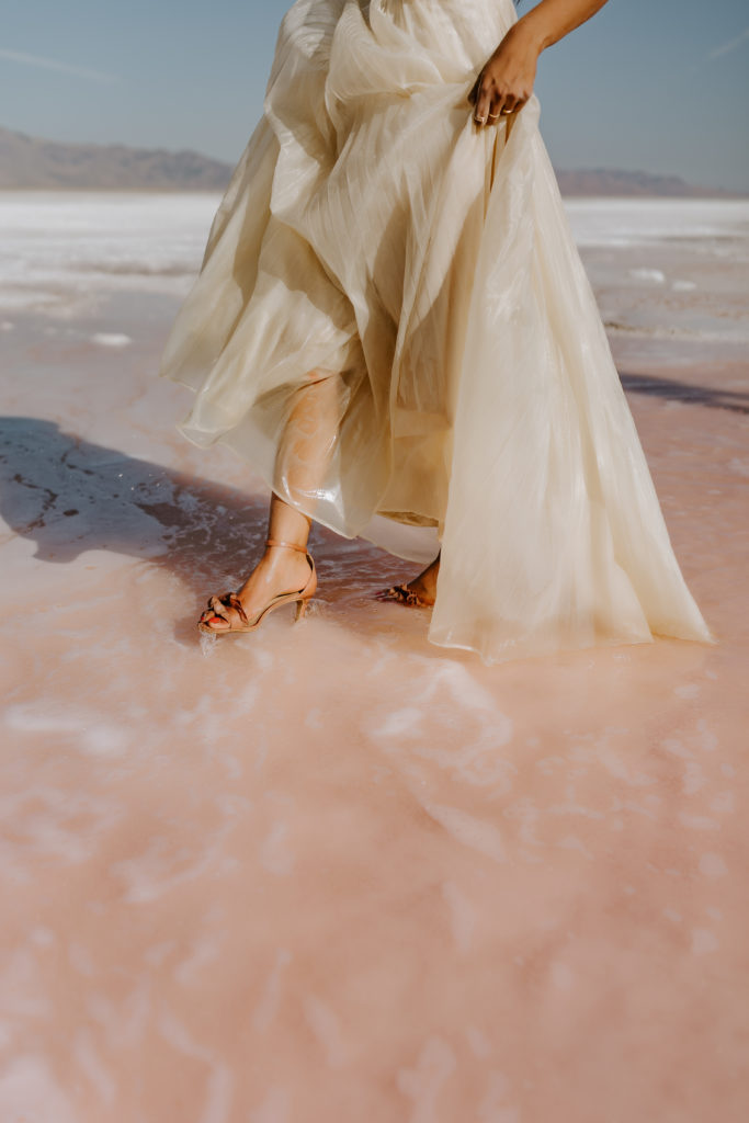 bride's shoes in the pink lake  