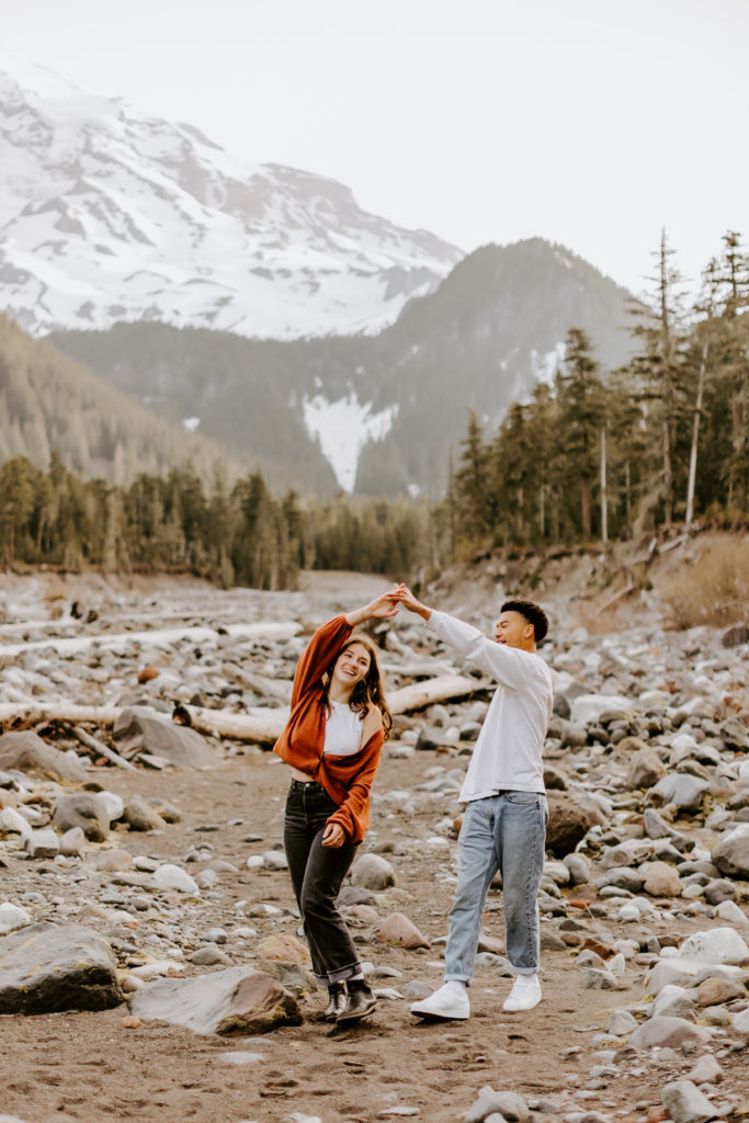 cute couple dancing at the Mt. Rainier park
