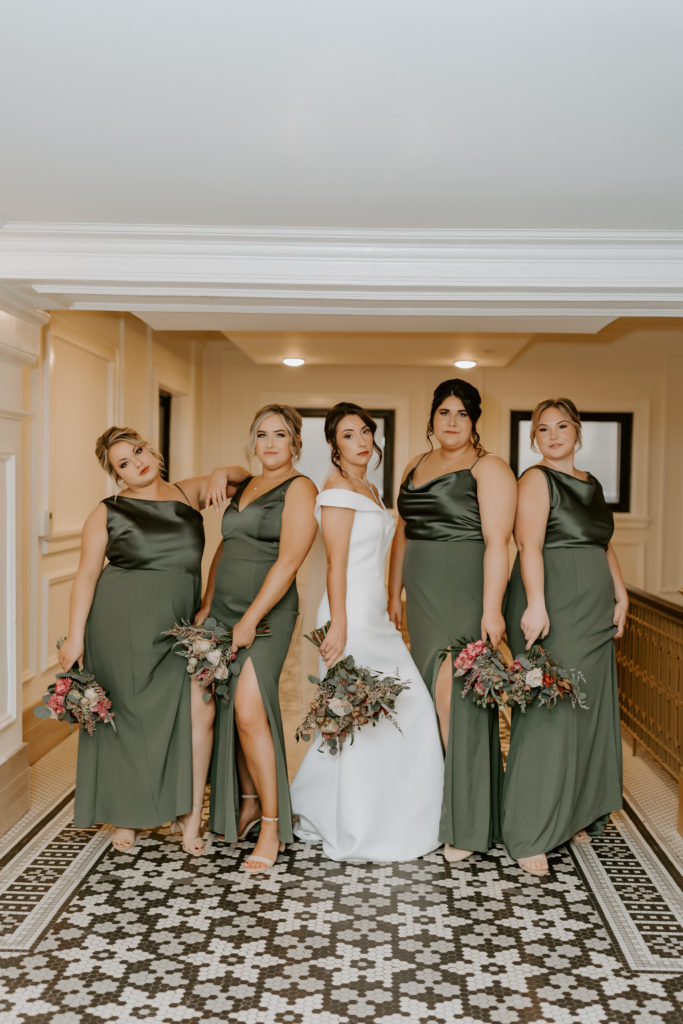 Bridal party girls in green dresses  at The Hotel Northland, Green Bay