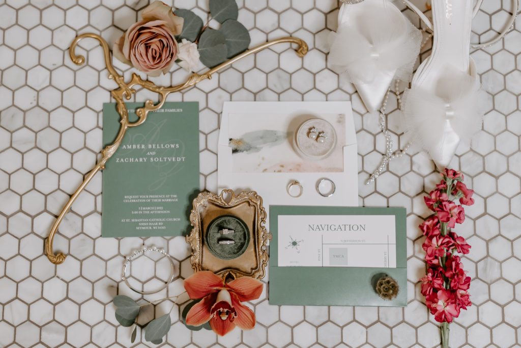styled wedding details on the tile floor