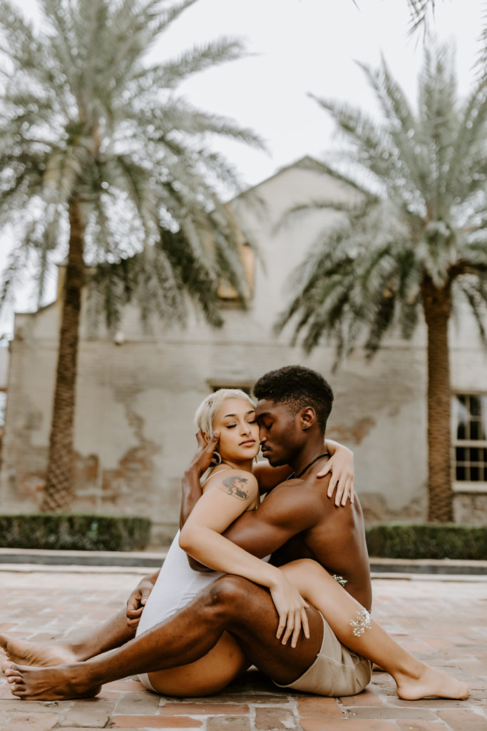 romantic black couple hugging each other 
