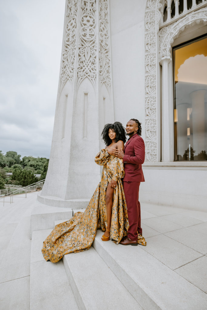 black couple in big yellow dress and maroon suit 