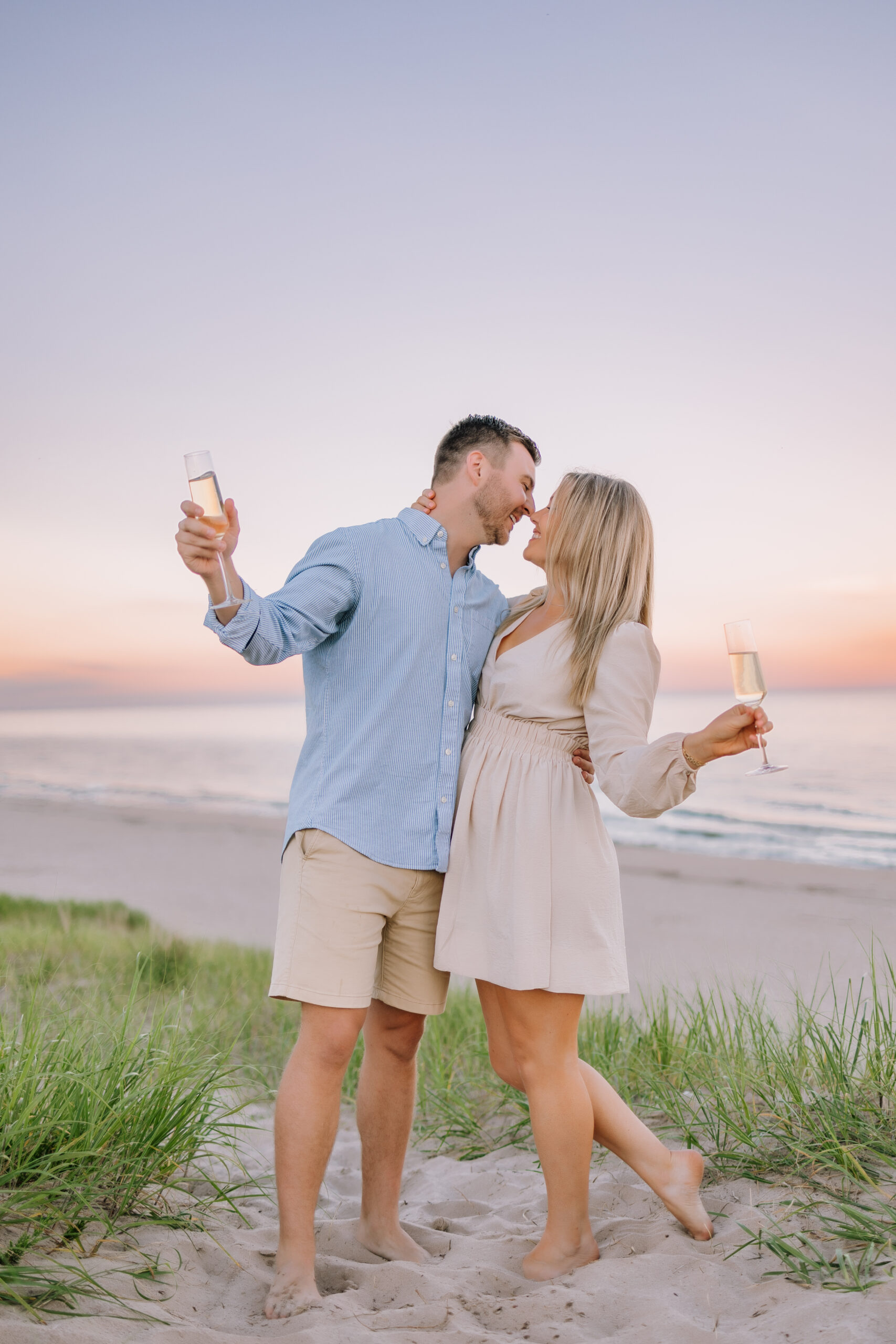 romantic engagement session at Kohler-Andrae State Park